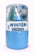 Soft winter butter slime with snow-themed charms in a portable double-sided jar